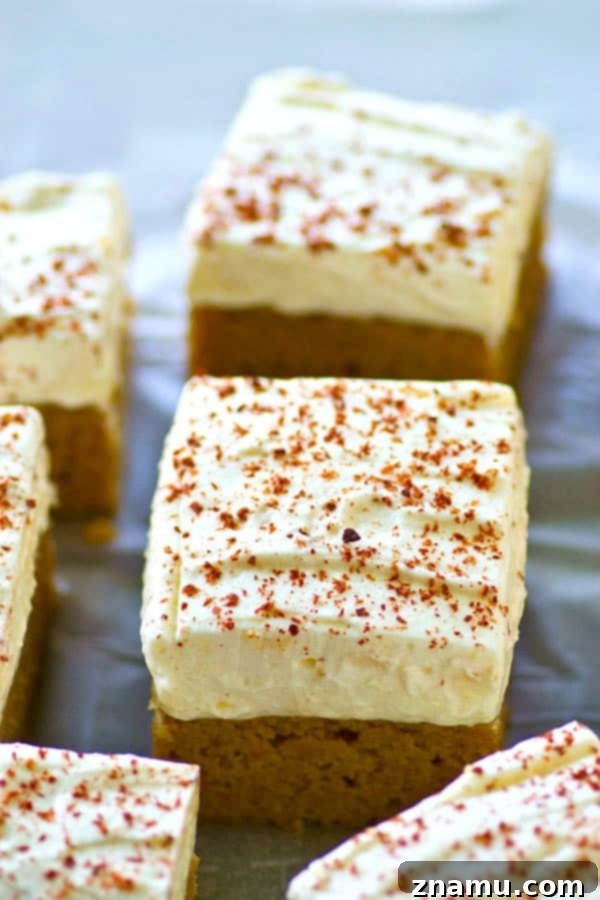 Frosted Coffee Frappuccino Sheet Cake sliced into perfect squares, showcasing the generous frosting layer, gluten-free and THM-friendly