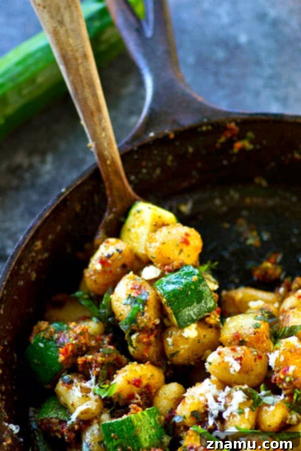 Gnocchi with Sun-Kissed Tomato Pesto and Smoky Zucchini 2 Sun-Dried Tomato Pesto Gnocchi with crispy gnocchi, rich pesto, and charred zucchini