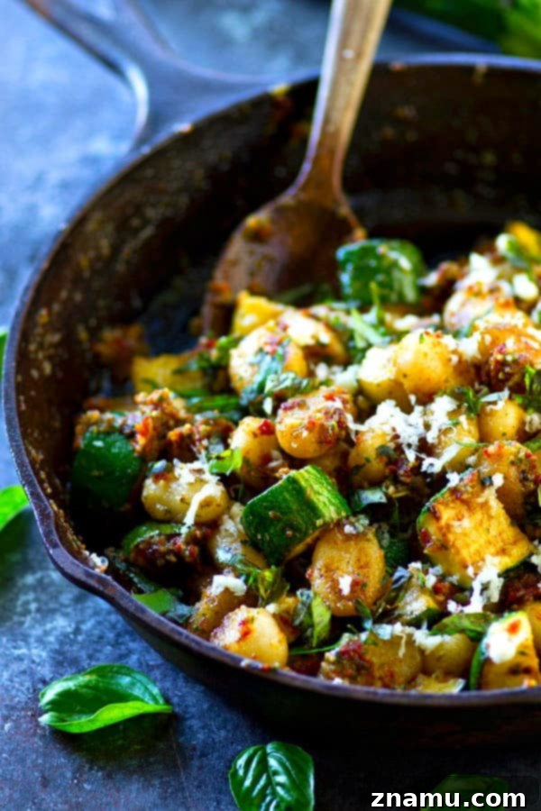 Gnocchi with Sun-Kissed Tomato Pesto and Smoky Zucchini 3 Close-up of Sun-Dried Tomato Pesto Gnocchi in a skillet