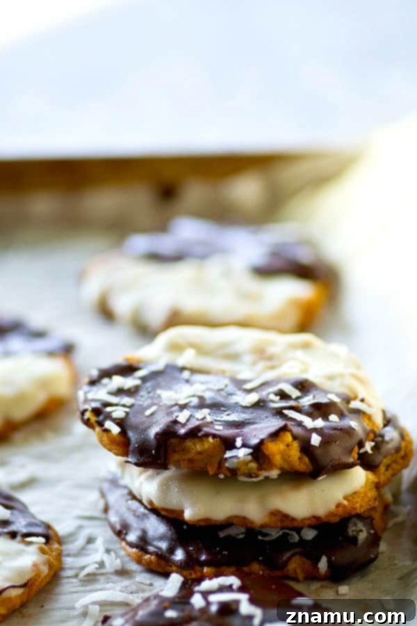 Duo Tone Coconut Delights 5 Row of Black and White Coconut Cookies with a dusting of shredded coconut