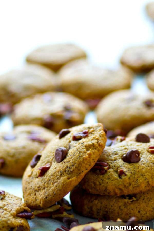 Espresso-Infused Crispy Chocolate Chip Cookies 5 A stack of golden brown crispy espresso chocolate chip cookies, ready to be devoured.