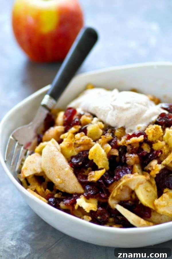 Warm Cranberry Apple Brown Betty with Spiced Chai Cream 5 A sweet apple cranberry filling is a match made in heaven with a buttery spiced cracker topping and piles of chai whipped cream on top in this classic apple brown betty!
