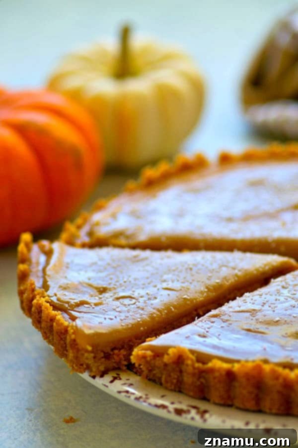 Decadent Salted Butterscotch Pumpkin Tart 3 A silky pumpkin filling sits on top of a buttery vanilla wafer crust and a homemade salted butterscotch sauce covers every inch of this INCREDIBLE pumpkin salted butterscotch tart!