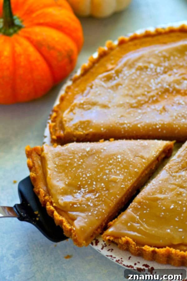 Decadent Salted Butterscotch Pumpkin Tart 5 A silky pumpkin filling sits on top of a buttery vanilla wafer crust and a homemade salted butterscotch sauce covers every inch of this INCREDIBLE pumpkin salted butterscotch tart!