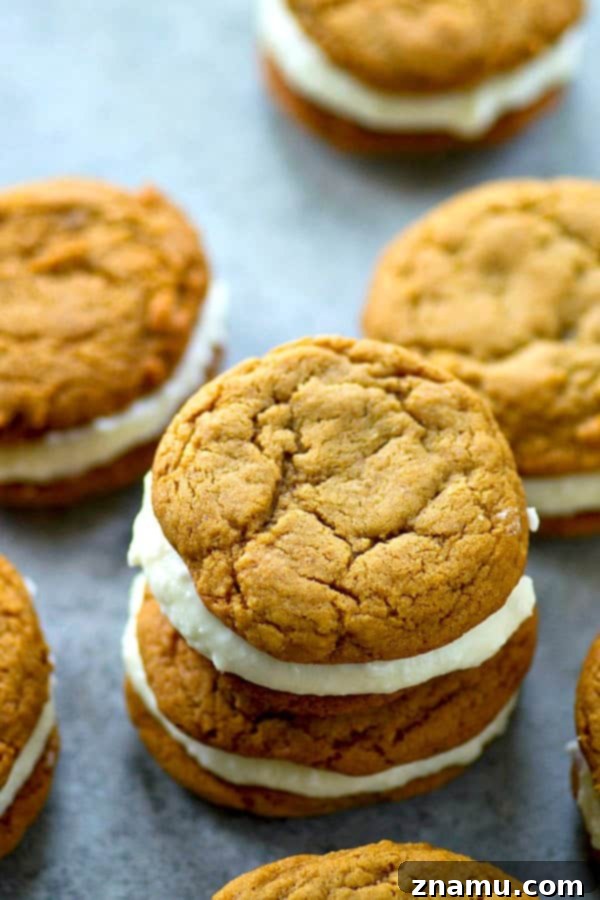 Spiced Gingerbread White Chocolate Dream Cookies 3 Soft gingerbread cookies meet a creamy white chocolate cream cheese filling in these festive gingerbread white chocolate sandwich cookies! Perfect for any cookie tray.