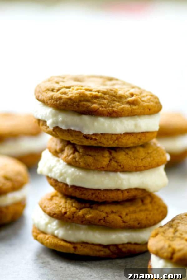 Spiced Gingerbread White Chocolate Dream Cookies 5 Soft gingerbread cookies meet a creamy white chocolate cream cheese filling in these festive gingerbread white chocolate sandwich cookies! Perfect for any cookie tray.