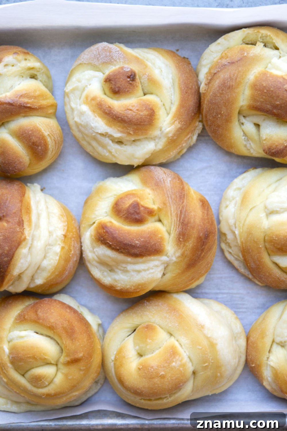 Decadent Cream Cheese Morning Buns with Coffee Glaze 3 A close-up shot of homemade cream cheese morning buns, showcasing the golden-brown crust and tempting cream cheese swirl, ready for coffee glaze.