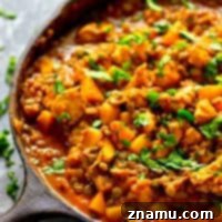 Harvest Gold Chicken Curry 7 Soft delicata squash and hearty lentils collide in this incredibly flavor-packed lentil delicata squash chicken curry! Serve over hot fluffy rice for a hearty, healthy winter meal.