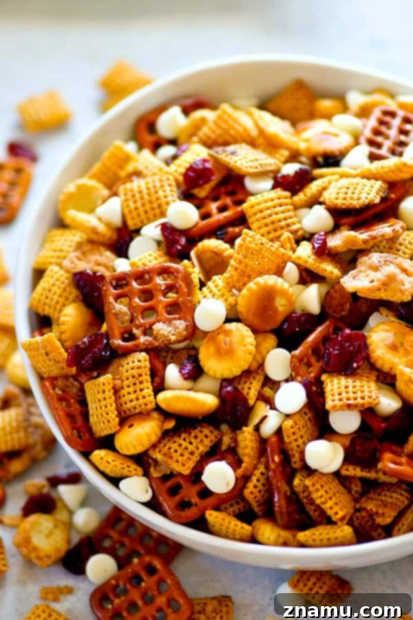 Sweet & Salty Cranberry Delight Mix 2 Sweet 'n' salty flavors pair with cranberries and white chocolate in this ADDICTING cranberry bliss snack mix! Make a big batch because it'll go fast!