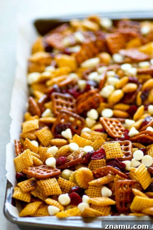 Sweet & Salty Cranberry Delight Mix 4 Sweet 'n' salty flavors pair with cranberries and white chocolate in this ADDICTING cranberry bliss snack mix! Make a big batch because it'll go fast!