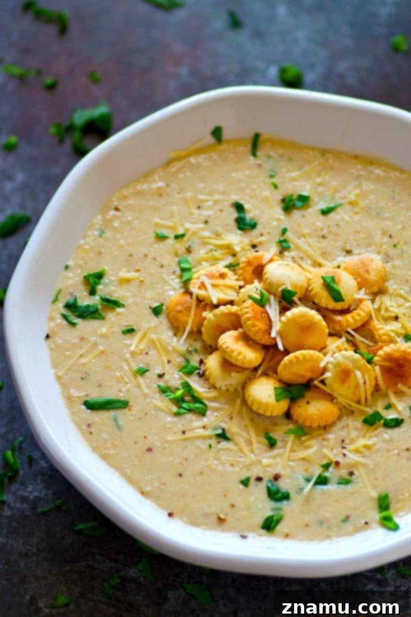 Velvety Roasted Cauliflower Parmesan Bisque 4 Insanely creamy and LOW on the calories, this roasted cream of cauliflower Parmesan soup packs a punch of cozy flavors and you'll be wanting bowl after bowl!
