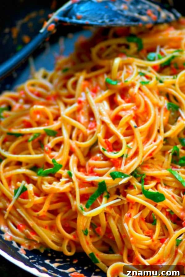 Light Roasted Red Pepper Fettuccine Alfredo 5 Smooth and creamy roasted red pepper alfredo sauce in a blender after being pureed.