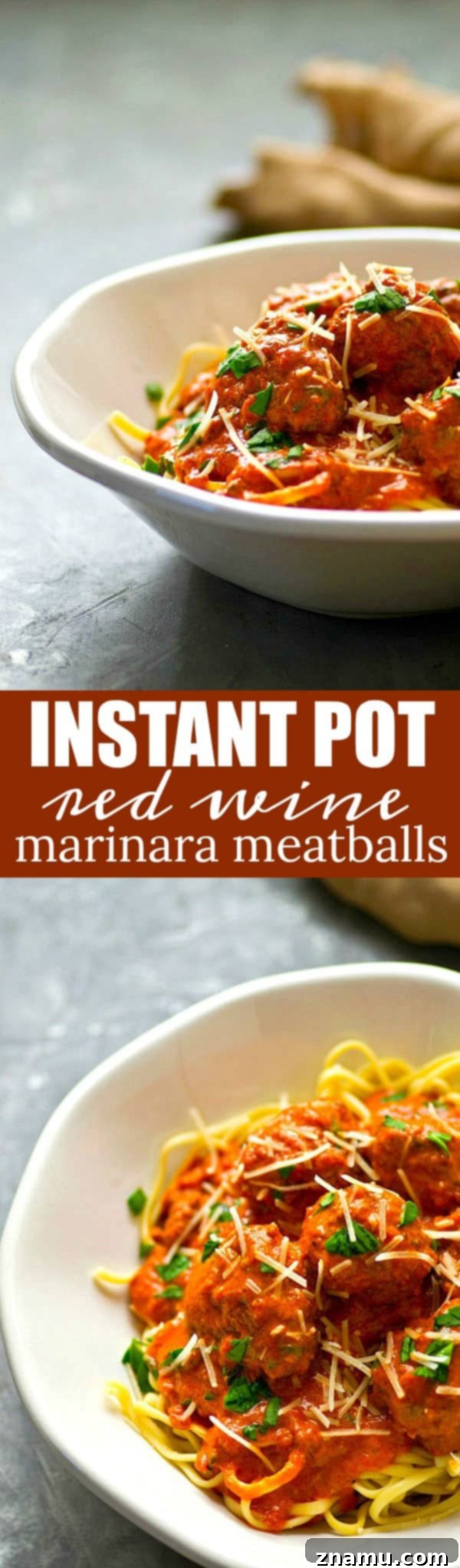 Close-up of a single incredibly tender meatball in a pool of rich red wine marinara sauce, showcasing its texture