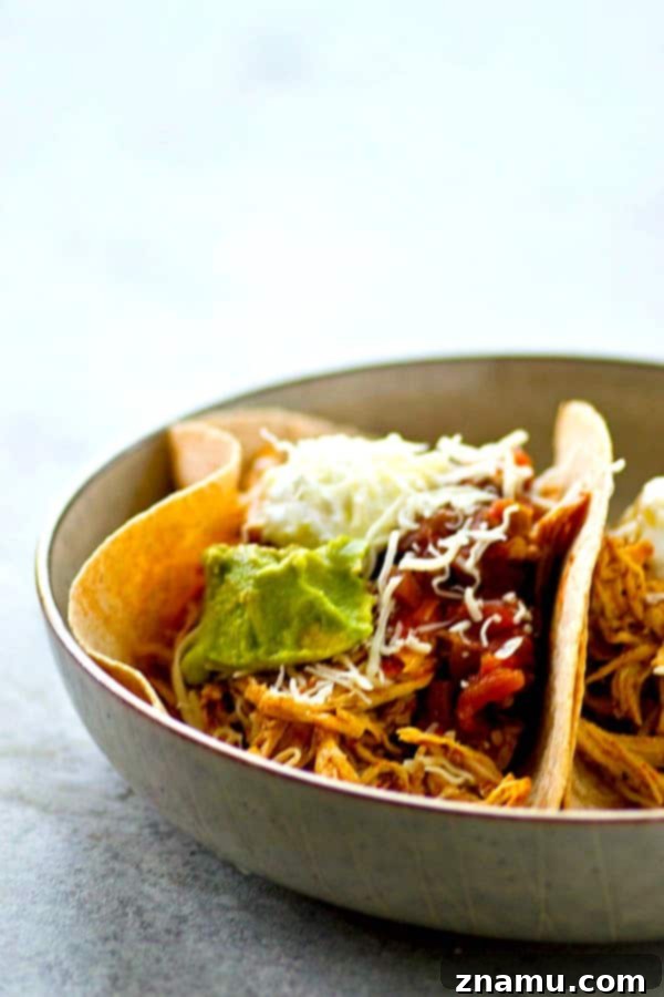 Instant Pot Shredded Taco Chicken 3 Homemade taco seasoning and a quick cook in the instant pot are the secrets behind this INCREDIBLY tender and flavorful taco shredded chicken! Perfect for topping tacos and salads!
