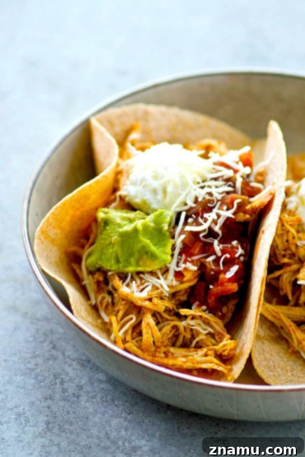 Instant Pot Shredded Taco Chicken 5 Homemade taco seasoning and a quick cook in the instant pot are the secrets behind this INCREDIBLY tender and flavorful taco shredded chicken! Perfect for topping tacos and salads!