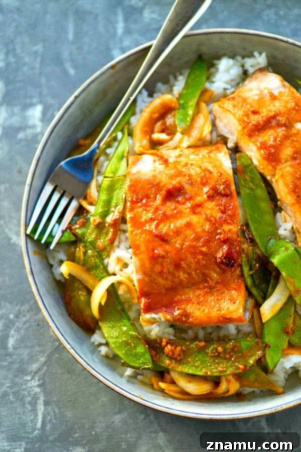 Easy One-Pan Hoisin Salmon and Snow Peas 2 Effortless Sheet Pan Hoisin Salmon and Snow Peas ready for serving, highlighting the rich homemade hoisin sauce.