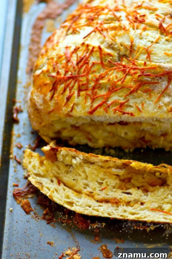 Artisan Caramelized Onion Asiago Loaf 5 Flavorful caramelized onion and sharp asiago cheese are the perfect duo in this stunning asiago no-knead bread! Its made overnight for easy baking the next day and SO incredibly tender and flavorful!