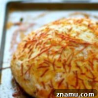 Artisan Caramelized Onion Asiago Loaf 7 Flavorful caramelized onion and sharp asiago cheese are the perfect duo in this stunning asiago no-knead bread! Its made overnight for easy baking the next day and SO incredibly tender and flavorful!