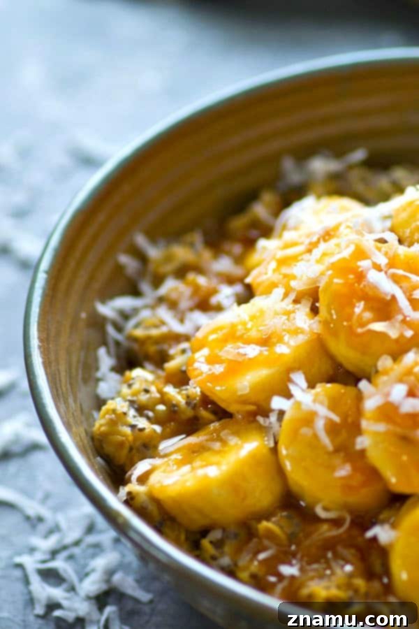Tropical Chia Caramelized Banana Oatmeal 3 Close-up of a Creamy Oatmeal Bowl topped with Caramelized Bananas