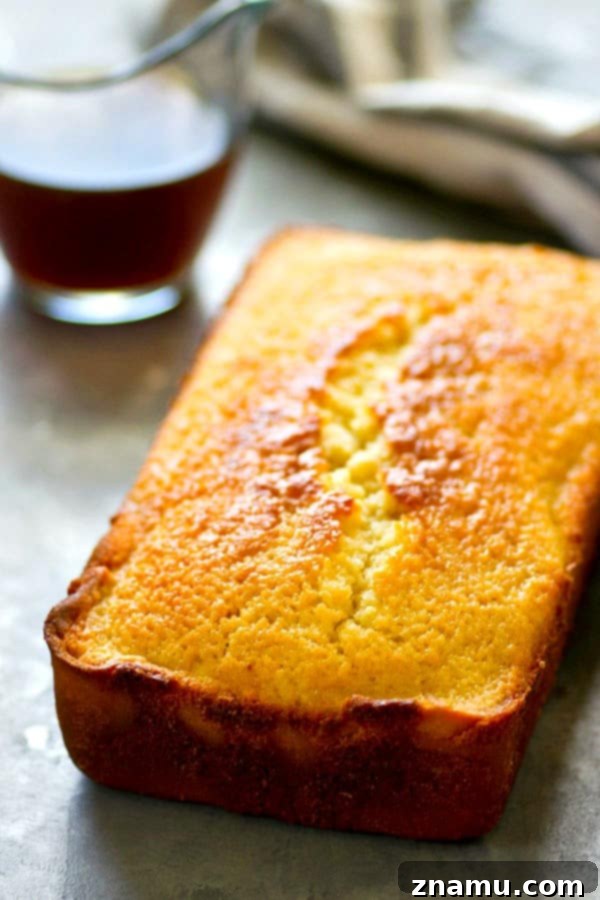 Velvet Espresso Pound Cake 3 A slice of Espresso Pound Cake, showcasing its moist texture and inviting crumb, ready to be enjoyed with a hot beverage