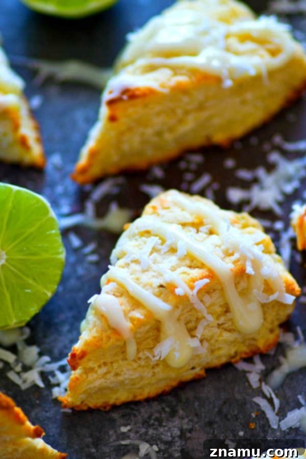 Key Lime Pie Coconut Scones 4 Freshly baked coconut key lime pie scones on a cooling rack, ready for glaze