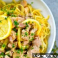 Incredibly flavorful, fall-apart tender lemon herb butter chicken is made in MINUTES in the instant pot and so good piled over hot noodles or rice!