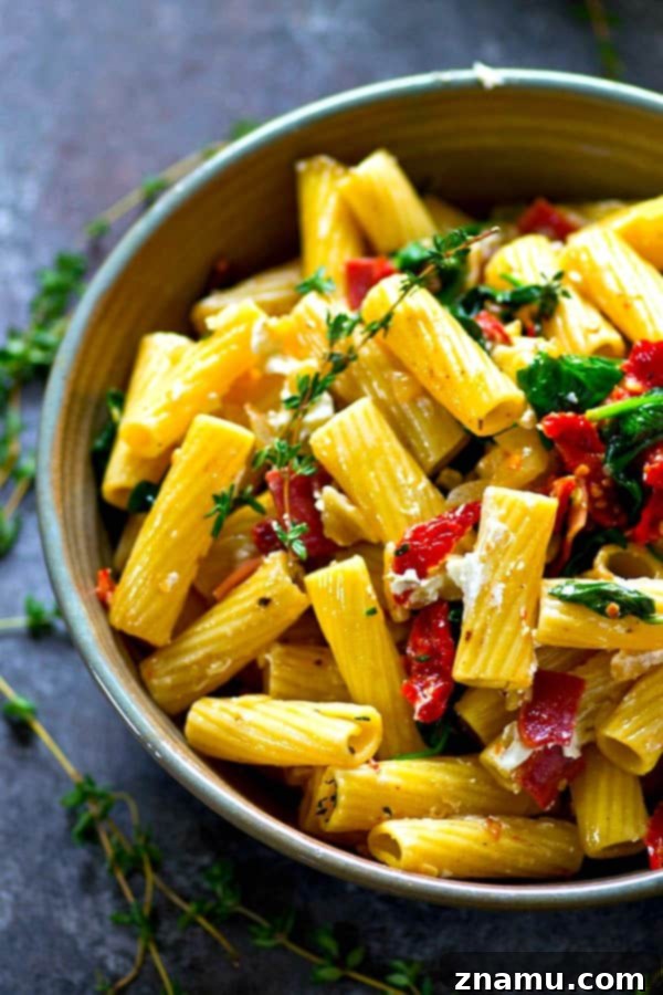 Goat Cheese Rigatoni with Smoky Bacon and Sun-Kissed Tomatoes 2 Smoky bacon, tangy sun-dried tomatoes, and soft goat cheese are an INCREDIBLE trio of flavors in this fresh, flavorful sun-dried tomato bacon goat cheese rigatoni!