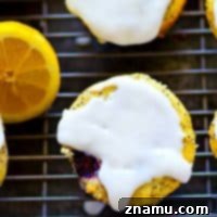 Zesty Lemon Blackberry Poppyseed Muffins 7 Exploding with juicy blackberries, tons of lemon poppyseed flavor and covered in a tangy lemon glaze, these lemon poppyseed blackberry muffins will be an INSTANT brunch hit!