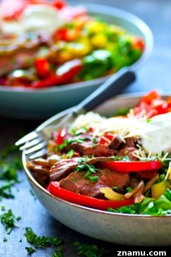 Spiced Beef Fajita Salad with Tropical Mango Pico de Gallo 3 Loaded grilled beef fajita salad with fresh ingredients