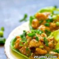 Sticky Sesame Honey Garlic Chicken Lettuce Wraps 7 A sweet, sticky homemade sesame honey sauce coats EVERY inch of these loaded honey garlic chicken lettuce wraps! You can make them WAY ahead of time for easy lunches.