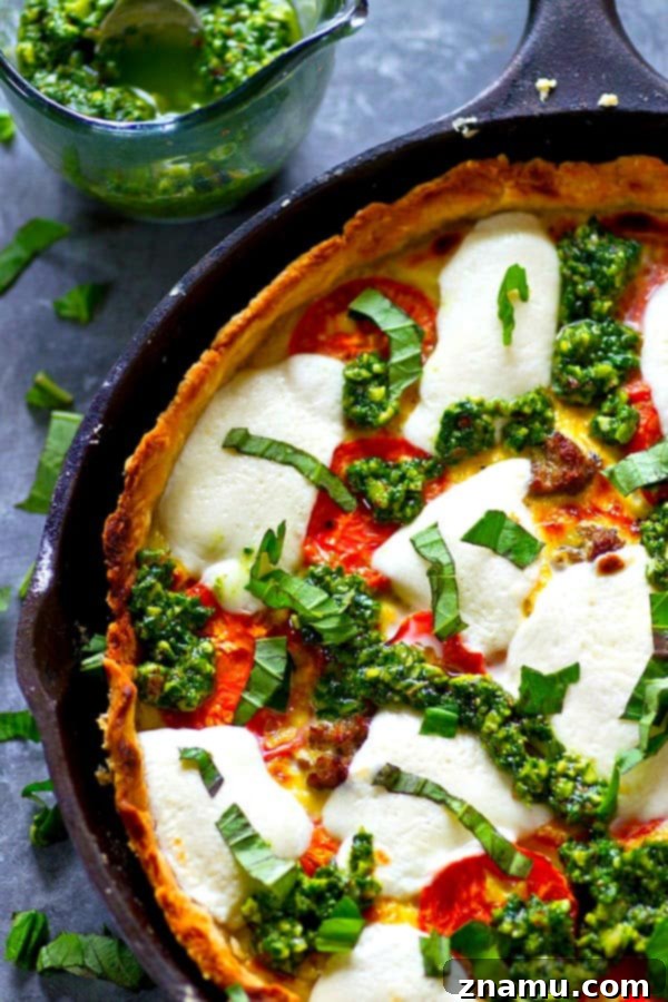 Skillet Caprese Quiche with Basil Pesto Sausage 3 A fresh homemade basil pesto and all the caprese fixins' are a match made in brunch heaven in this skillet basil pesto sausage caprese quiche! Cut BIG slices of this luscious quiche for best results.