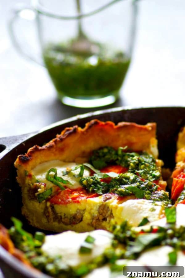Skillet Caprese Quiche with Basil Pesto Sausage 5 A fresh homemade basil pesto and all the caprese fixins' are a match made in brunch heaven in this skillet basil pesto sausage caprese quiche! Cut BIG slices of this luscious quiche for best results.