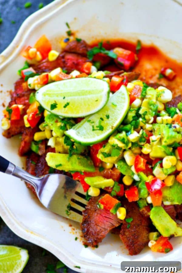 A spicy homemade blackened seasoning coats every inch of this grilled blackened steak that's served with a zippy charred corn avocado salsa piled over top!