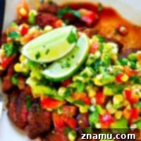 A spicy homemade blackened seasoning coats every inch of this grilled blackened steak that's served with a zippy charred corn avocado salsa piled over top!