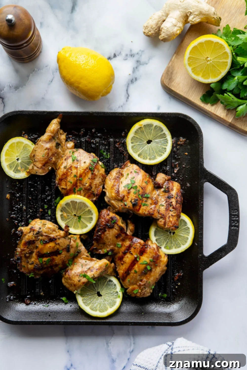 Lemon Ginger Soy Grilled Chicken 3 Close-up of fresh ginger root, lemons, and soy sauce, key ingredients for the marinade