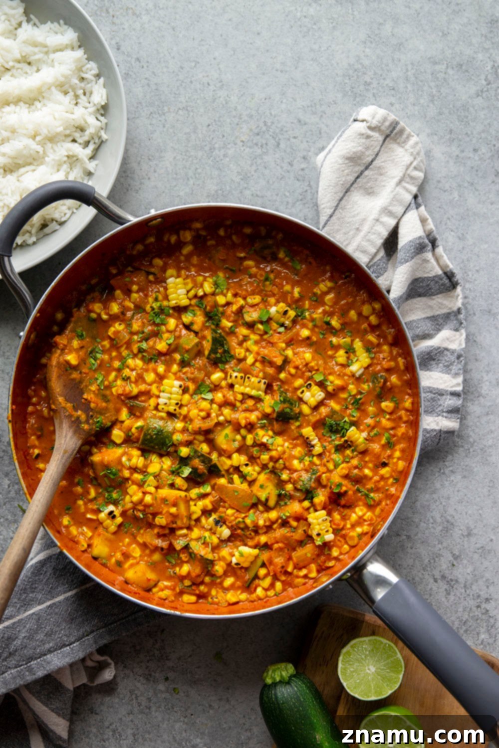 Smoky Sweet Corn Zucchini Curry 3 Charred sweet corn and tender zucchini simmers in a flavorful coconut curry sauce and is incredible served over fluffy rice. This sweet corn zucchini curry is a great way to use up summer vegetables!