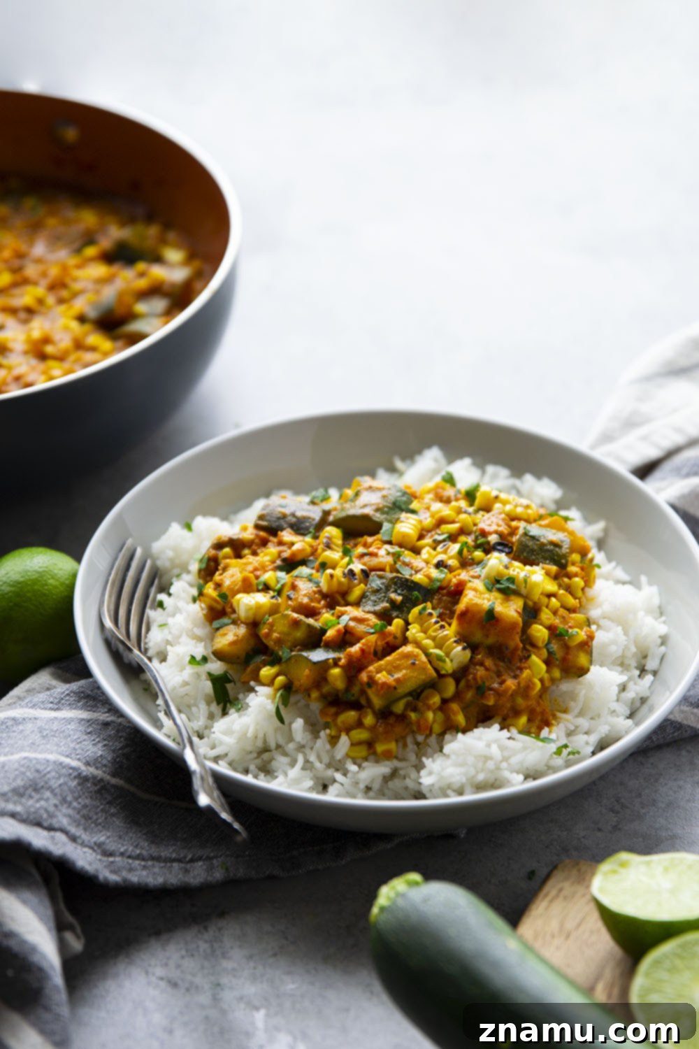 Smoky Sweet Corn Zucchini Curry 4 Charred sweet corn and tender zucchini simmers in a flavorful coconut curry sauce and is incredible served over fluffy rice. This sweet corn zucchini curry is a great way to use up summer vegetables!