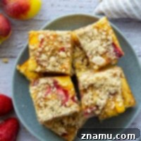 Summer Strawberry Peach Bake 8 Fresh strawberries and peaches join forces in this streusel covered strawberry peach buckle that's a perfect summer coffee cake or dessert!