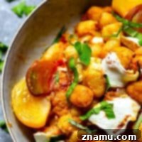 Juicy roasted heirloom tomatoes and creamy fresh mozzarella make the most amazing flavor duo in this summery mozzarella gnocchi skillet that you'll have on the table in MINUTES!