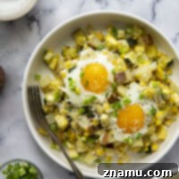 Sunny Summer Squash & Sweet Corn Sheet Pan Hash 8 Only ONE sheet pan required for this summery sweet corn summer squash breakfast hash! Packed with tender veggies, crispy potatoes, and beautiful sunny-side up eggs.