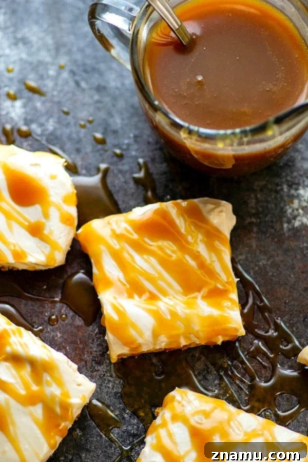Coffee Caramel Cheesecake Dream Bars 2 A beautifully presented stack of no-bake butterscotch coffee cheesecake bars, topped with rich homemade butterscotch sauce.