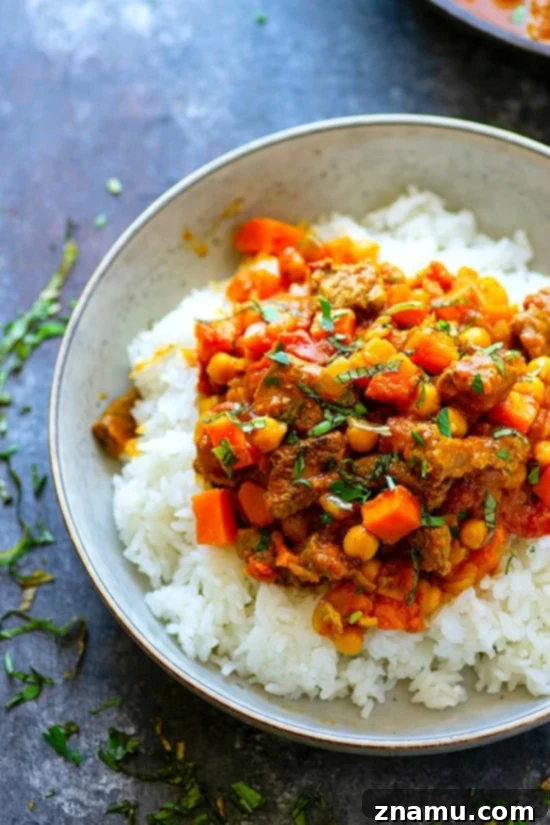 One Pot Beef Sweet Potato Chickpea Curry 4 One-Pot Beef Sweet Potato Chickpea Curry - Tender sweet potatoes and melt-in-your-mouth beef paired with tons of cozy curry spices make this one-pot beef sweet potato chickpea curry one for the dinner record books!