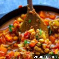 One-Pot Beef Sweet Potato Chickpea Curry - Tender sweet potatoes and melt-in-your-mouth beef  paired with tons of cozy curry spices make this one-pot beef sweet potato chickpea curry one for the dinner record books!