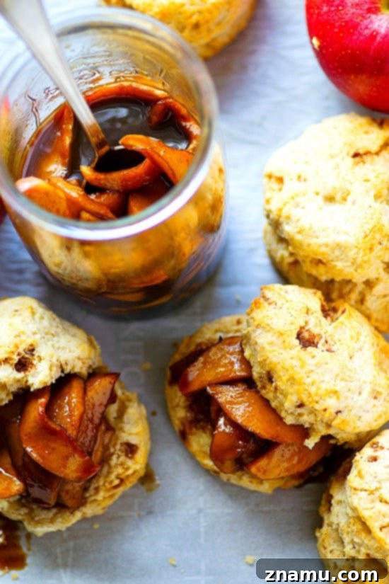 Nutty Brown Butter Biscuits with Apple Preserves 3 Close-up of a flaky browned butter biscuit filled with homemade apple preserves.