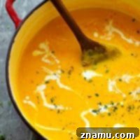 Velvet Pumpkin Beer Cheese Soup 7 Pumpkin Beer Cheese Soup - Creamy pumpkin beer cheese soup is going to be your FAVORITE way to warm up! Flavorful beer, silky fresh pumpkin puree, and tons of cheddar build SO much flavor in this cozy soup.