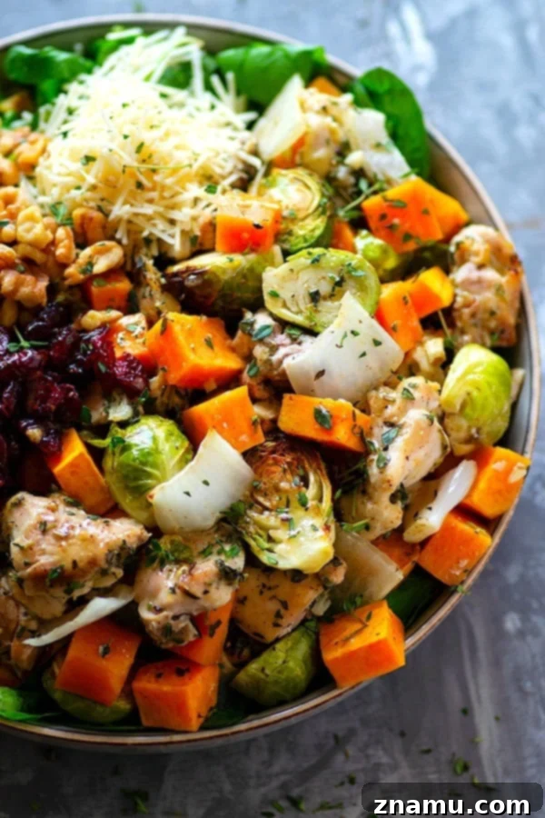 Honey-Glazed Rosemary Chicken with Autumn Harvest Salad 4 Assembling the Honey Rosemary Roast Chicken Spinach Salad in a large bowl