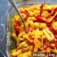 Pumpkin and Roasted Red Pepper Mac & Cheese 7 Baked Pumpkin Roasted Red Pepper Mac 'n' Cheese - Flavorful roasted red peppers and creamy pumpkin take this ultimately cheesy baked roasted red pepper mac 'n' cheese to the next level!