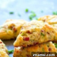 Savory White Cheddar Bacon Scallion Scones 7 White Cheddar Bacon Scallion Scones - Sharp white cheddar, smoky bacon, and lots of scallions are the perfect flavor trio for these savory scones. - perfect for breakfast or alongside your favorite soup!