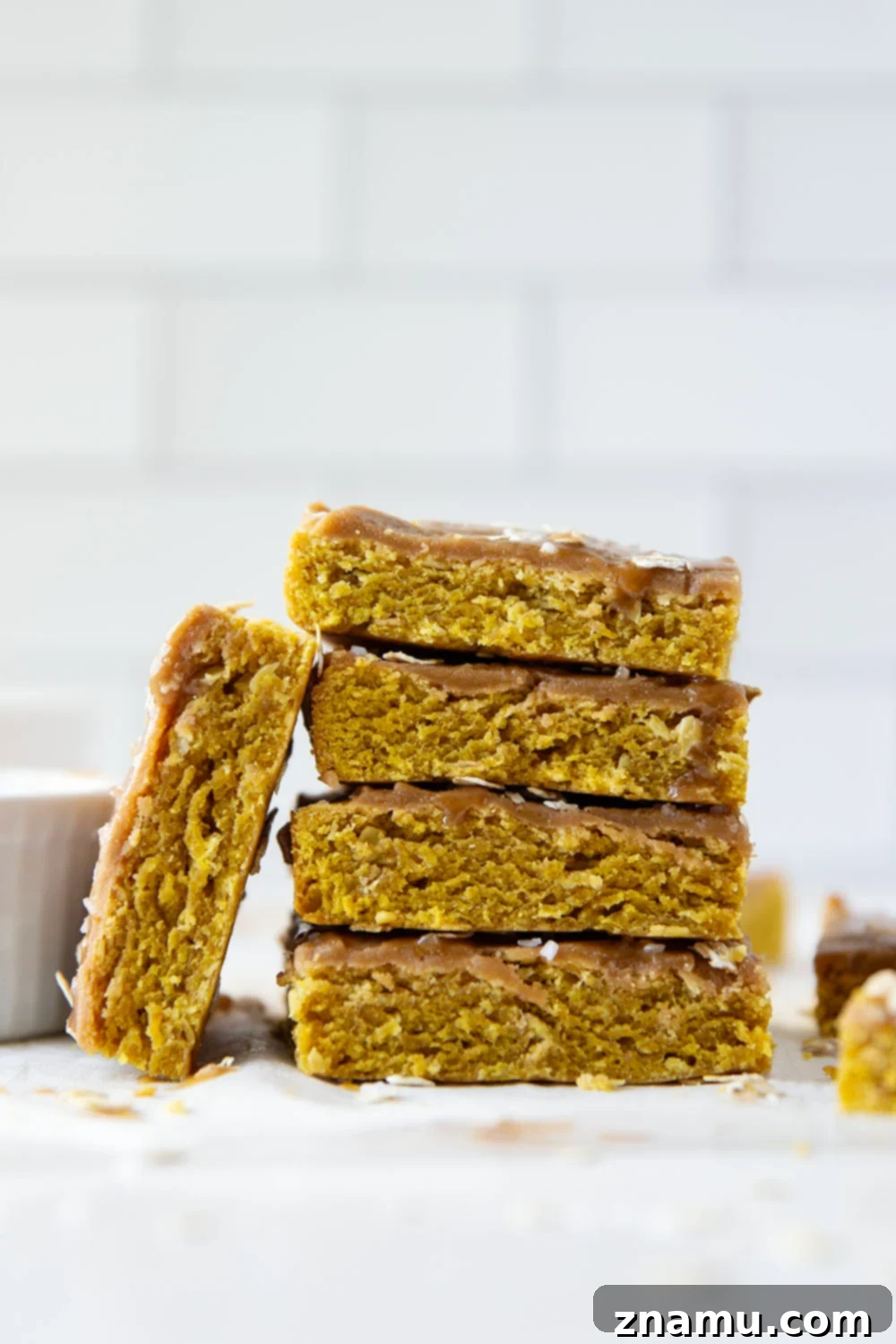 Salted Caramel Drizzled Pumpkin Oat Shortbread Bars 5 Soft and buttery oatmeal pumpkin shortbread bars with a salty caramel sauce drizzled on top are the ultimate fall treat!