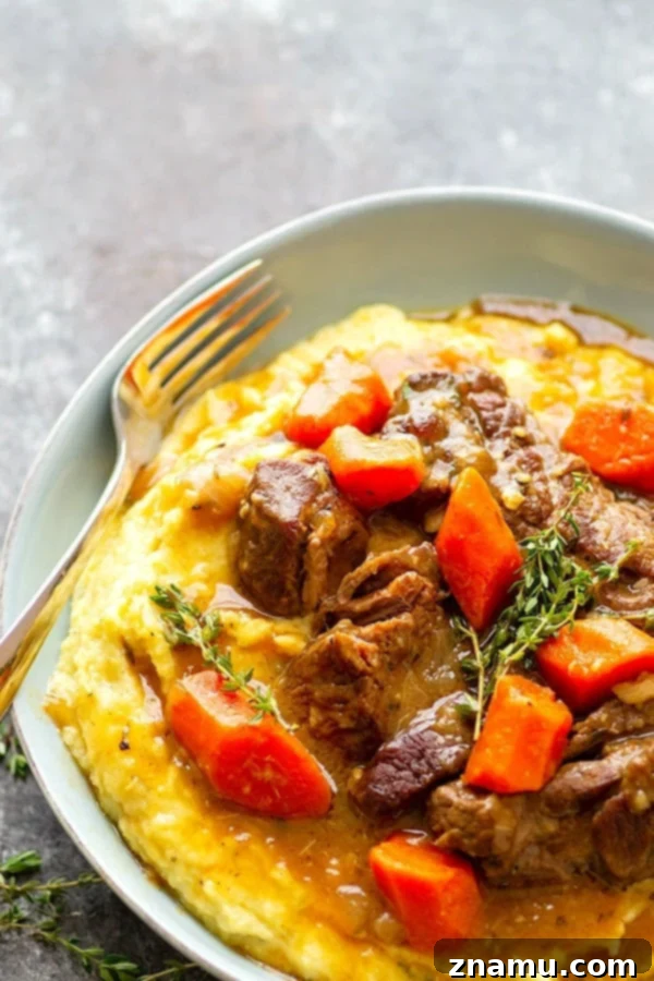 Fork-Tender Stout Ribs with Velvety Mascarpone Polenta 2 Stout-Braised Beef Short Ribs over creamy mascarpone polenta, a perfect comfort food dish.